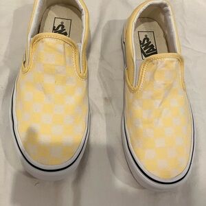 Van’s Off the Wall pale yellow checkered skater slip ons. Great shape. Size 7.5.
